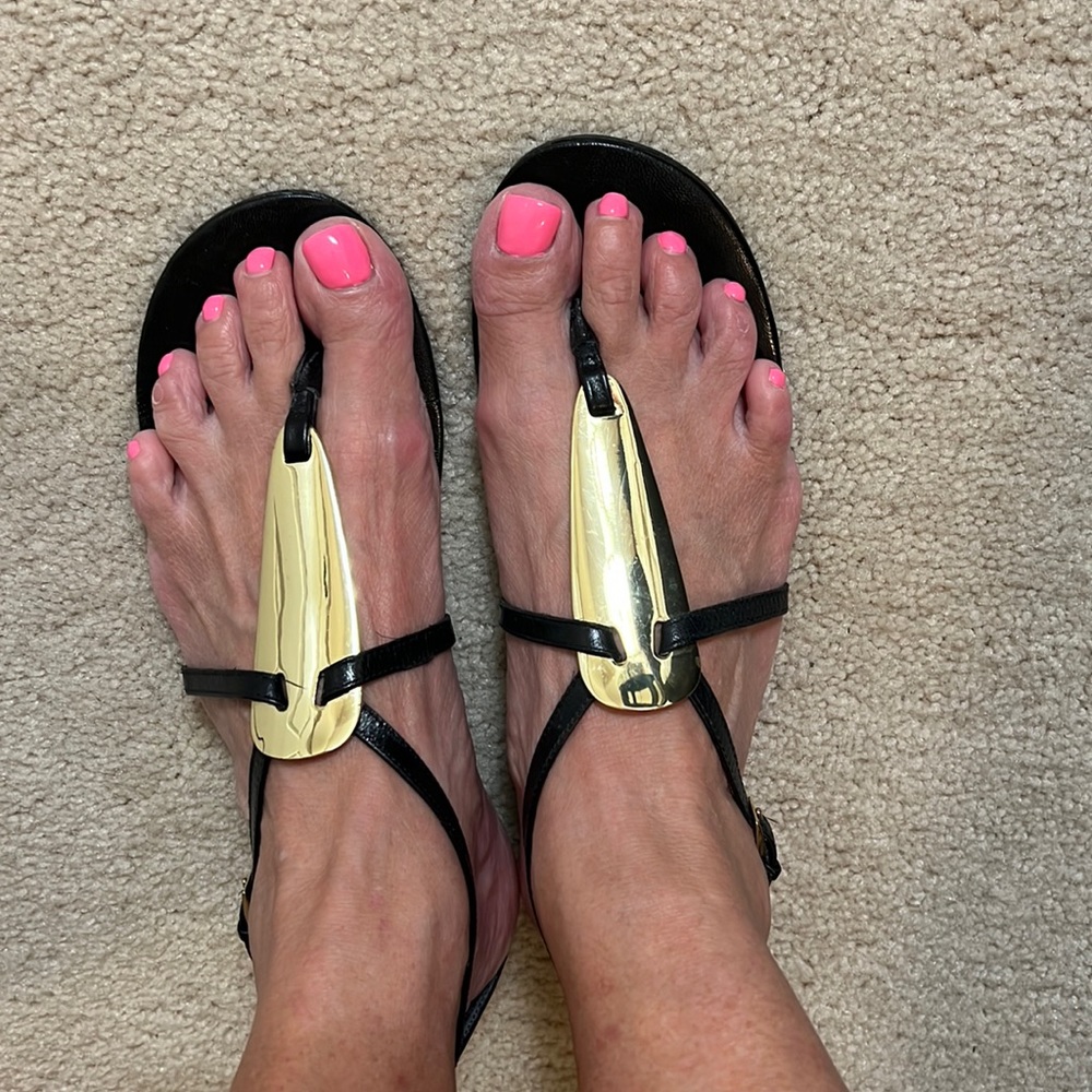 Nine West black and gold ankle stray sandal in size 7.5( size worn off). Worn